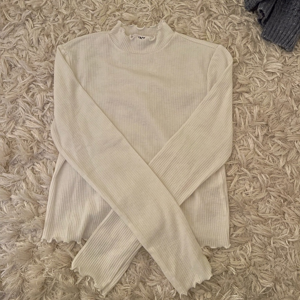 White scalloped long sleeve sweater